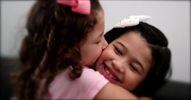 Cute Mix Race Little Sisters Kissing Each Other Children Siblings — Wideo stockowe