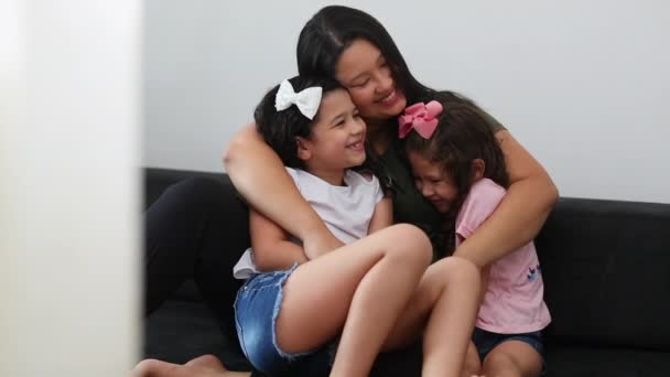 Mother Hugging Daughters Arms Candid Asian Mom Hugs Her Mixed — Stock video