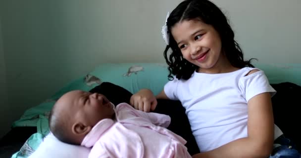 Hispanic Little Girl Playing Black Baby Doll Small Child Talking — Stock videók