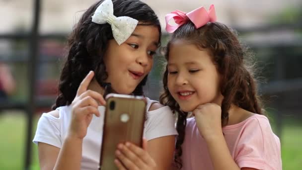 Kids Using Smartphone Happy Little Sisters Holding Cellphone — Video