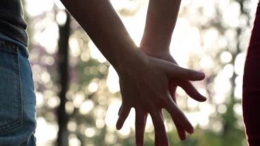 Joining hands together, and then disjoining them