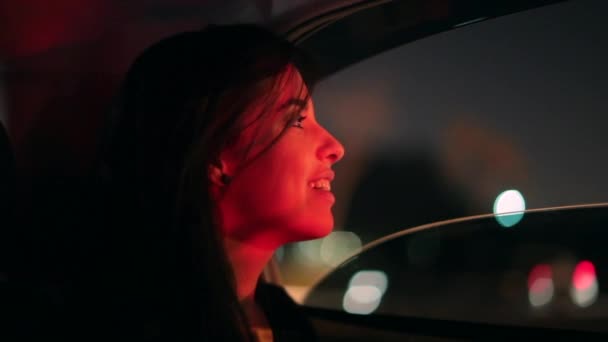 Girl Looking Out Car Window Night Woman Starring City Lights — Video Stock