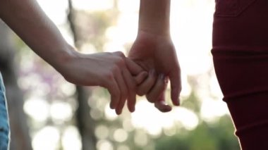 Close-up of holding hands by finger