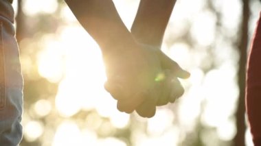 Letting go of love, splitting relationship by disjoining hands, concept