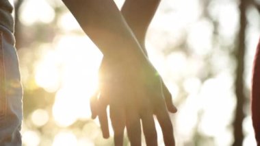 Letting go of love, splitting relationship by disjoining hands, concept