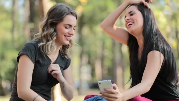 Candid Girlfriends Looking Cellphone Outdoors Social Media — 图库视频影像