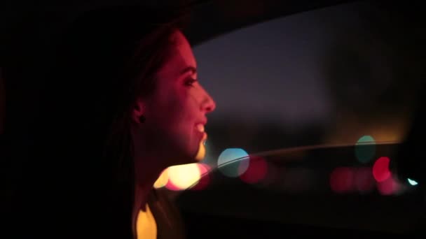 Girl Looking Out Car Window Night Woman Starring City Lights — Stock Video