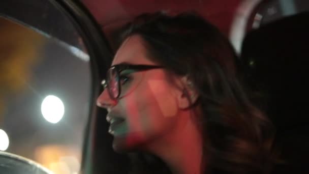 Woman Looking Out Car Window Night Woman Starring City Lights — Stock Video