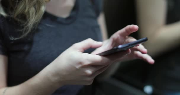 Casual Candid Young Woman Checking Her Cellphone Elevator — 图库视频影像