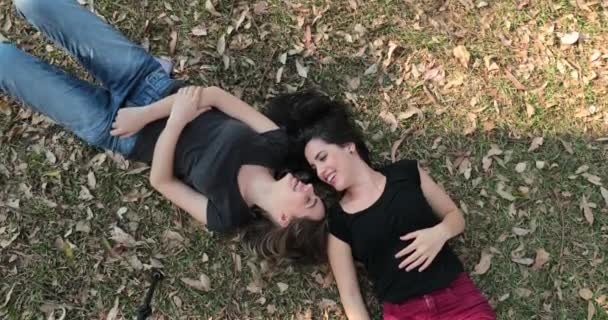 Girlfriends Lay Field Daydreaming Looking Each Other Smiling — Wideo stockowe