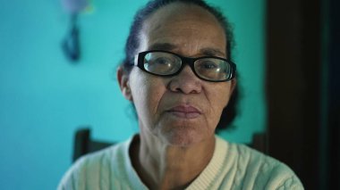 An African American senior woman portrait closeup face. A black elderly hispanic person