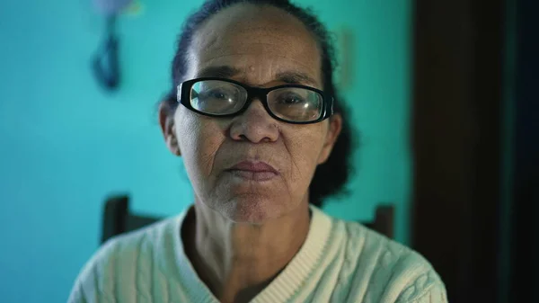 stock image An African American senior woman portrait closeup face. A black elderly hispanic person