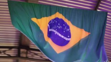 Brazilian flag hanging on ceiling during soccer football game