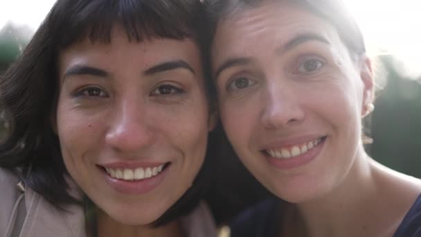 Two Young Women Faces Together Cheek Cheek Portrait Diverse People — Video Stock