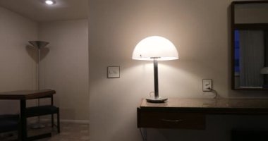 Man turns lights OFF when leaving apartment