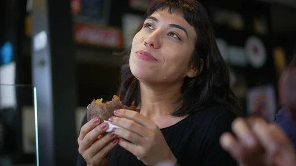 One Pensive Hispanic Girl Eating Burger Brazilian Person Eats Cheeseburger — Φωτογραφία Αρχείου