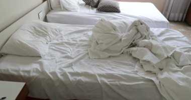 Messy hotel bed sheets