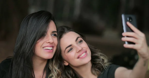 Girlfriends Taking Selfie Sticking Tongue Out Young Women Posing Photo — Foto Stock