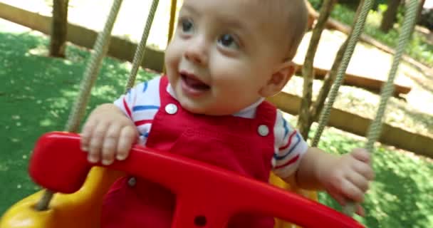 Pushing Baby Boy Park Swing Having Fun — Wideo stockowe