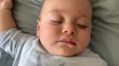 Beautiful cute baby infant in deep slomber sleep