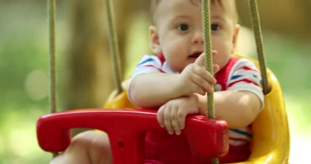 Adorable Baby Infant Playground Swing Happy — 图库视频影像