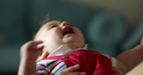 Cute Baby Boy Throwing Himself Backward Mother Chest — Stock videók