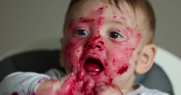 Dirty Messy Baby Infant Looking Camera Lunch Meal — Videoclip de stoc