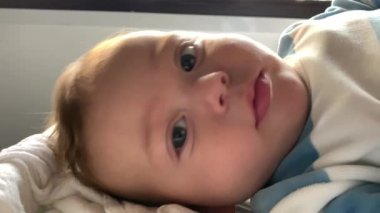Closeup of cute adorable baby infant blond boy