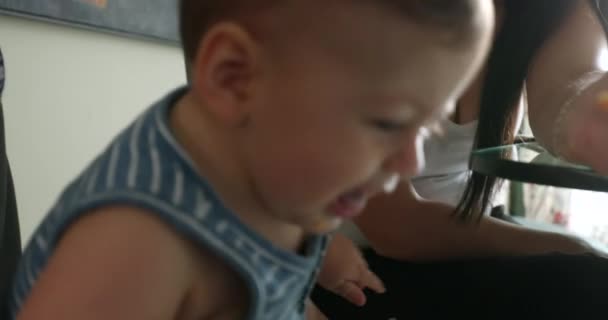 Mom Feeding Upset Baby Boy Infant — Stock video