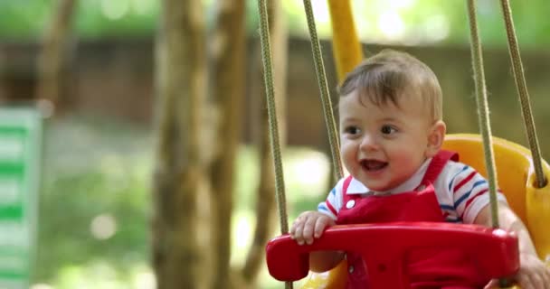 Cute Adorable Baby Boy Park Swing Outdoors Mom Pushing Infant — Wideo stockowe