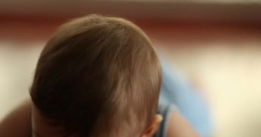 Toddler baby boy infant learning to crawl