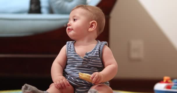 Cute Baby Toddler Waving Banana Air — Stockvideo
