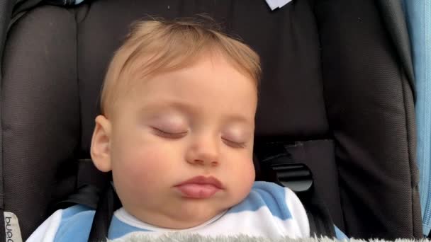 Adorable Baby Blonde Infant Boy Sleeping Car Chair — Video