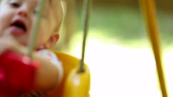 Baby Toddler Having Fun Playground Park Swing Slow Motion — Wideo stockowe