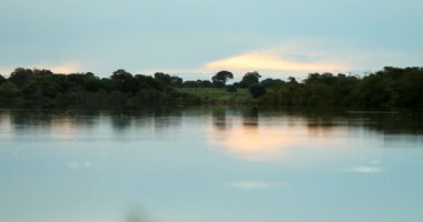 Scenic beautiful lake reflection during sunset in 4K