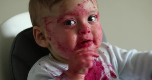 Baby Covered Red Beet Sauce Rubbing Face Hand — Wideo stockowe