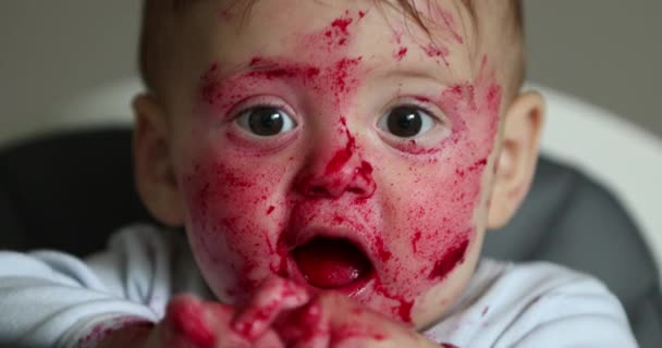Adorable Baby Covered Tomato Sauce Eating Lunch Closeup Dirty Portrait — Stock videók