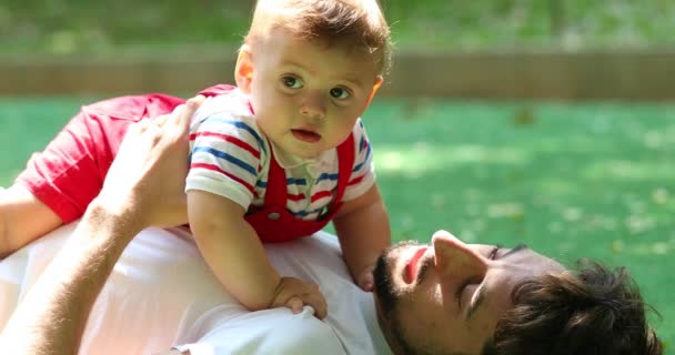 Baby Son Top Father Chest Outdoor Park — Vídeos de Stock