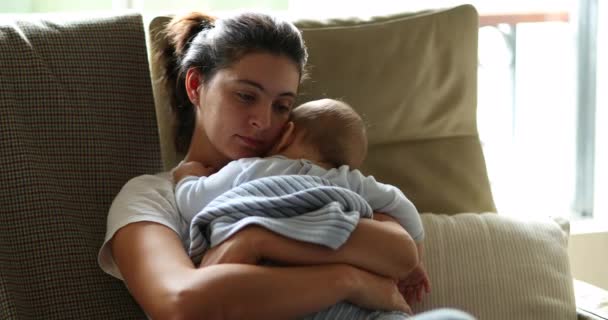 Tired Mother Holding Caring Baby Infant Couch Exhausted Mom Falling — Vídeo de Stock