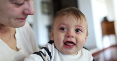 Baby boy wanting to touch camera