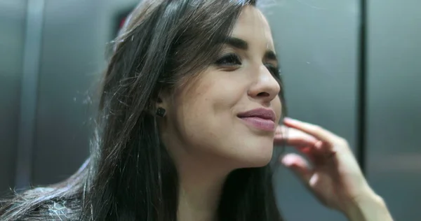 Young Hispanic Latina Girl Checking Herself Mirror Smiling Arranging Hair — Zdjęcie stockowe