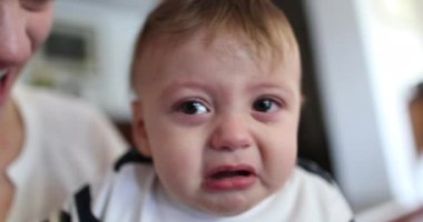 Upset tearful baby toddler face crying