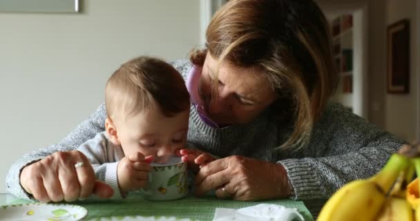 Grandmother Removing Object Baby Hand — Video