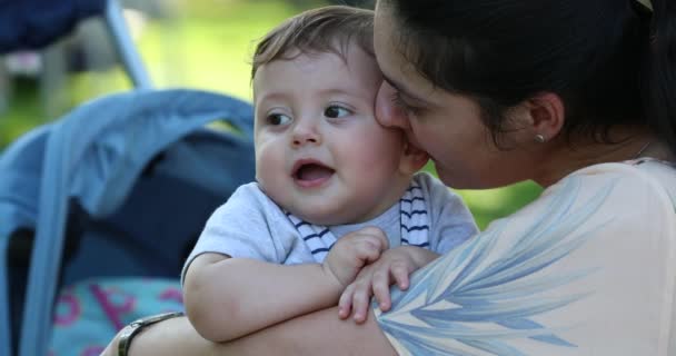 Mother Whispering Something Baby Toddler Infant Son Ear — Vídeo de Stock