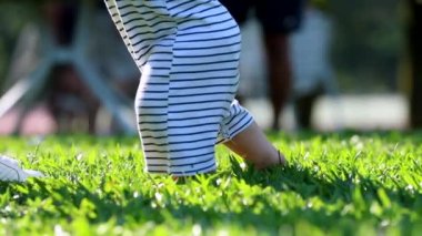 Little baby learns to walk. First Steps. Slow Motion 120 fps