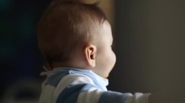 Mother feeding happy baby toddler infant boy lunch