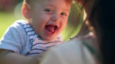 Happy joyful baby infant laughing and smiling portrait