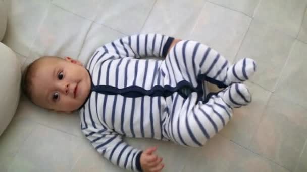 Adorable Toddler Baby Laid Bed Looking Camera — Videoclip de stoc