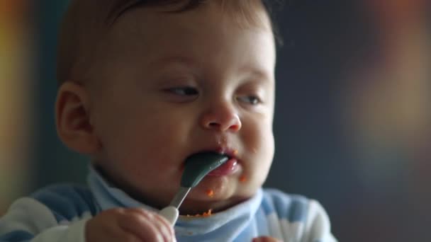 Cute Baby Face Portrait Closeup Infant Toddler Teething Biting Spoon — Vídeo de Stock