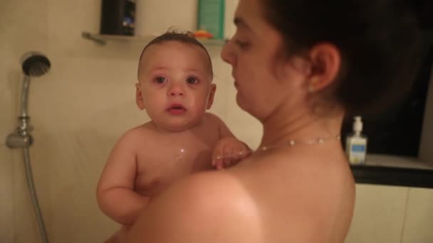 Casual Authentic Mother Holding Baby Infant Son Shower Bathing — ストック動画